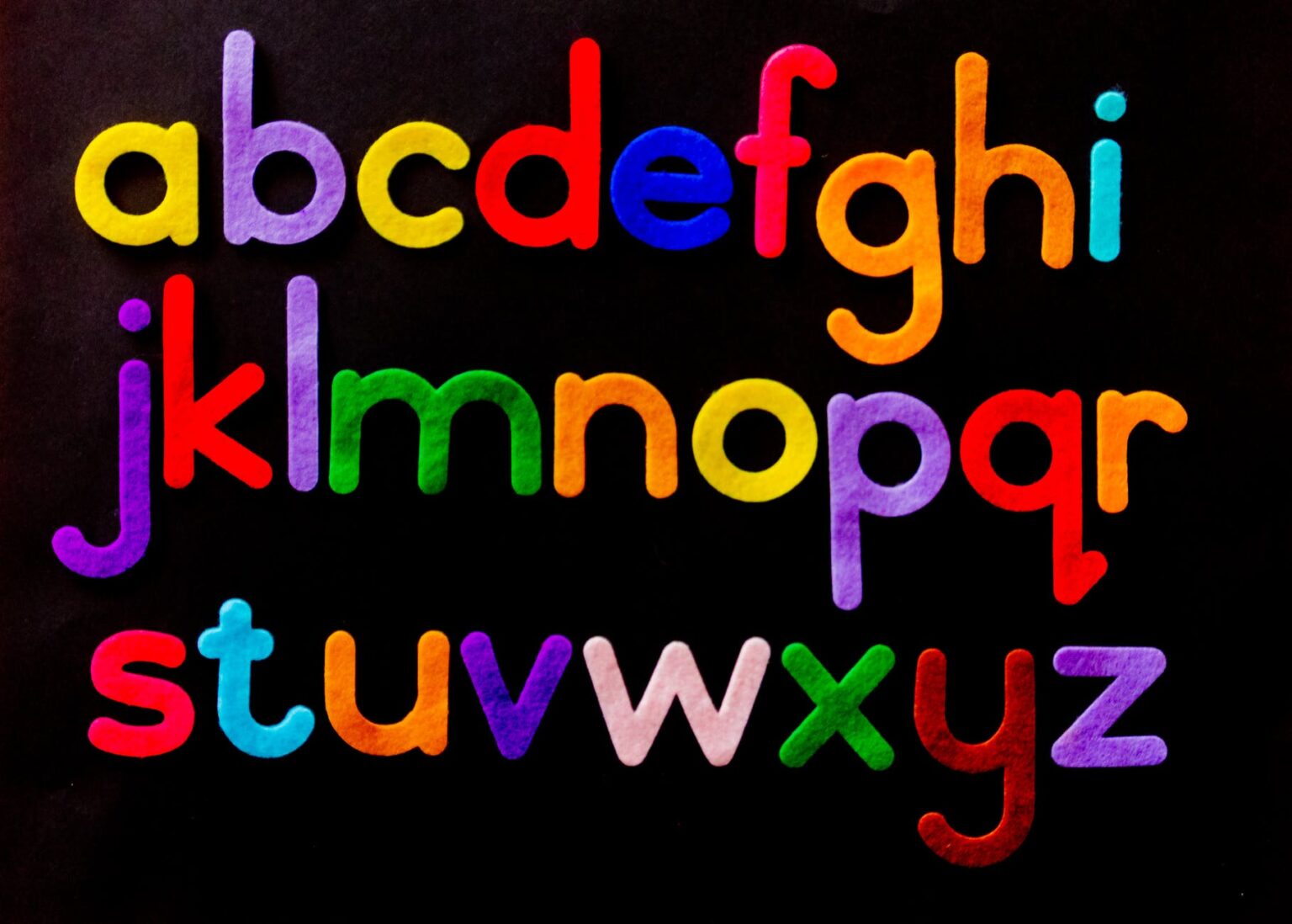 alphabet letter text on black background